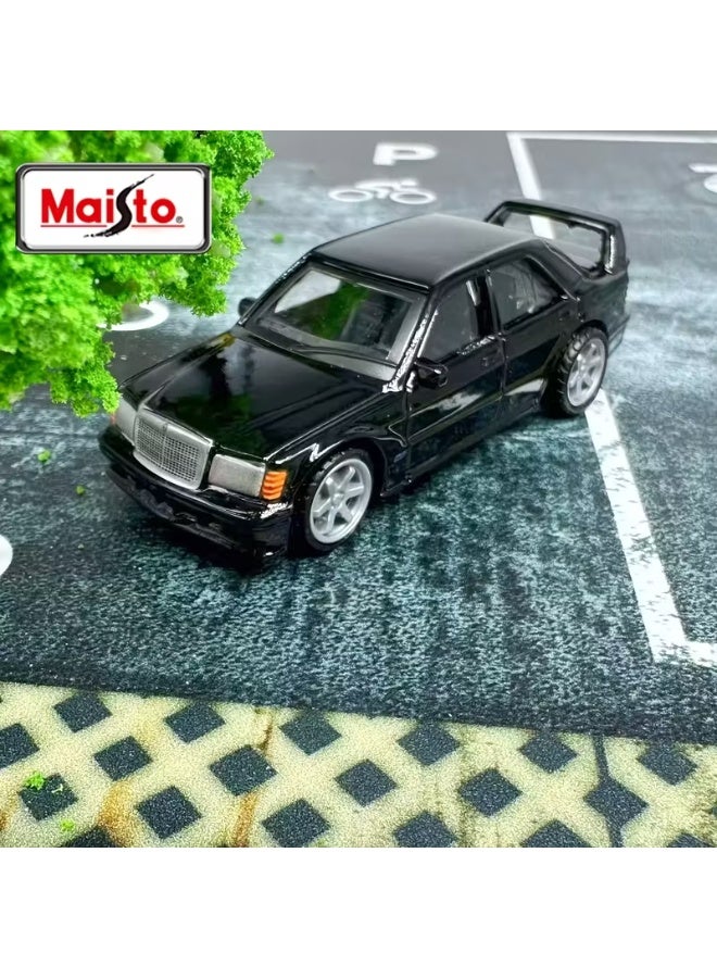 مايستو 1:64 scale model car, black flatbed trailer and black Mercedes 190E sports car carrier. Both cars are realistic and realistic in their exterior details. A beautiful looking car from the beautiful car models. You can play or decorate rooms, offices, living rooms, cafes, or on shelves for display. It is also suitable for car lovers and collectors. It is also suitable for professional photographers and advertising photographers to use as a background, or for professionals in making home models and merging them with the model, or adding them inside a transparent acrylic box and gifting it to your loved ones, parents or children, or as a gift for someone who drives the same car - Image 4