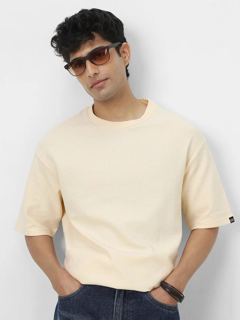 Urbano Fashion  Urbano Fashion Men's Cloud Cream Textured Round Neck Oversized Half Sleeve Cotton T-Shirt  | Best Price UAE