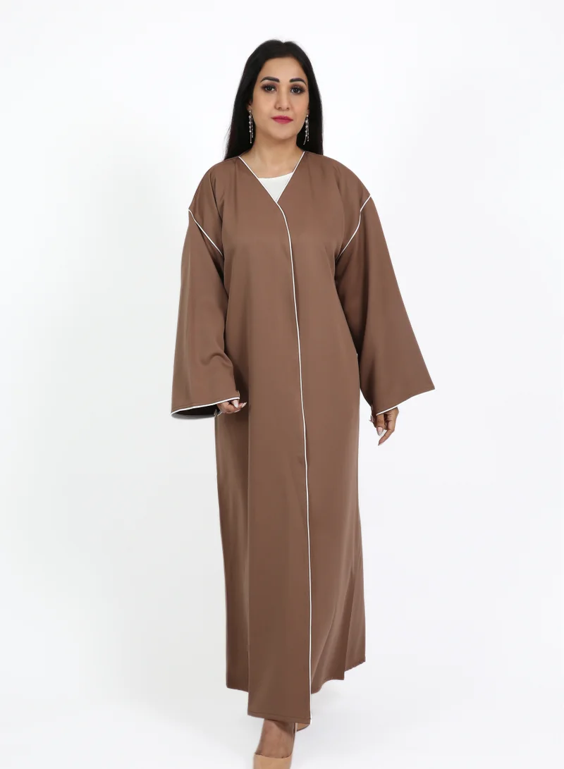Nikias Brown barbie crepe with off-white pipping in front and sleeves, overlap abaya for daily wear.