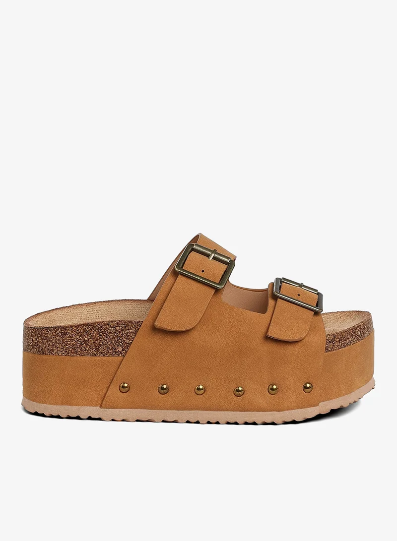 Studded Faux Leather Slip Ons in Tan