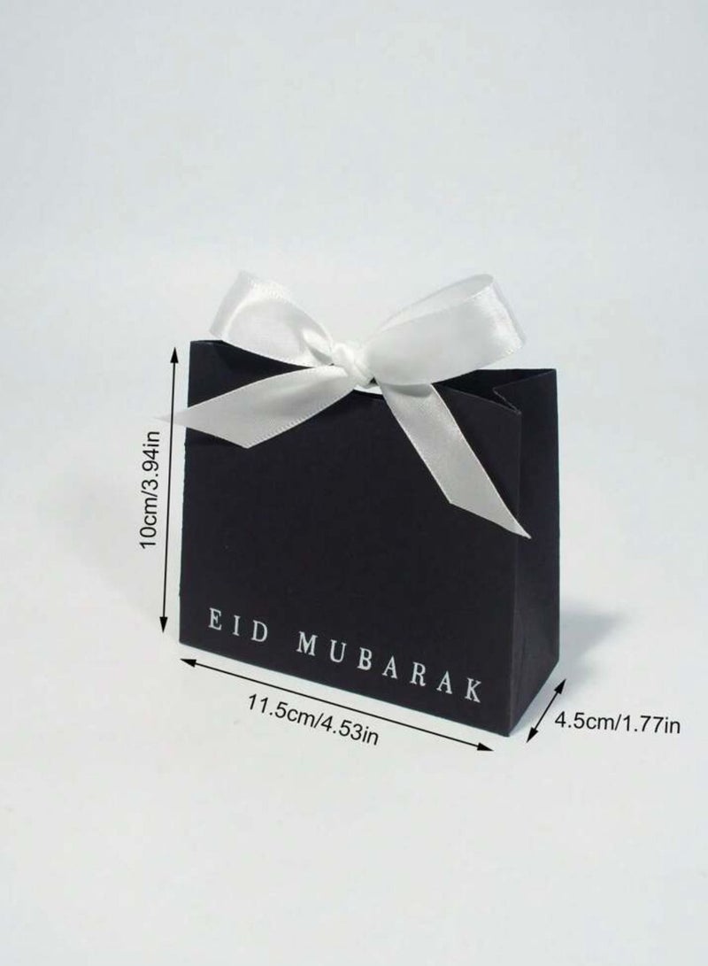 Generic Set of 5 luxurious small gift boxes for holiday occasions with elegant ribbons, size 11.50×10×4.5 cm, in black, perfect for presenting sweets, chocolates, and small gifts, for Eid al-Adha giveaways.  - Image 3
