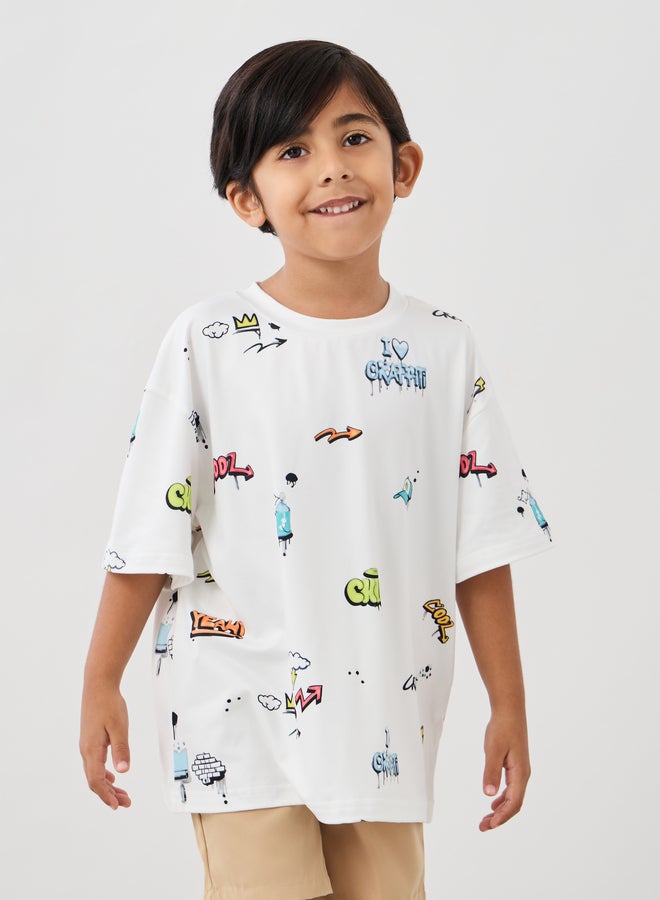 Styli All-Over Graffiti Print Short Sleeve Oversized T-Shirt  - Image 1