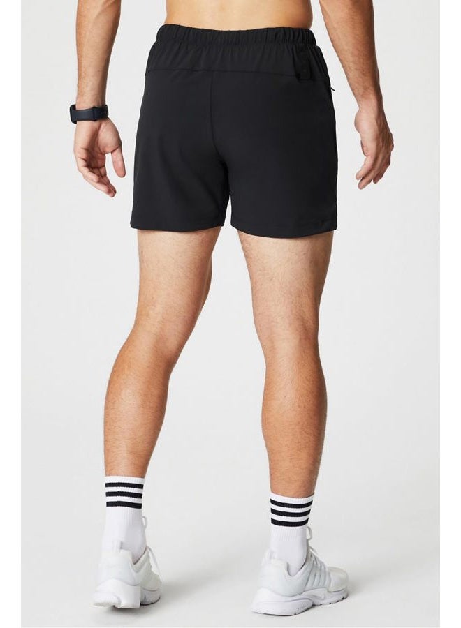 Fabletics Men's The One Short (Unlined), Training, Swimming, Lightweight, Quick-Dry, Zip Pocket, Stretch Woven, 5" Inseam, L, Black - Image 4
