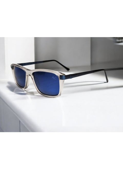 Authentic Armando Cavelli sunglasses, crafted from carefully selected premium acetate for a luxurious look and longevity with extensive use. This model combines modernity and classic style, with a raw transparent light grey acetate front and blue -plated metal temples to complete your luxury look. Comes with premium polymer lenses offer UV400 protection in a blue.