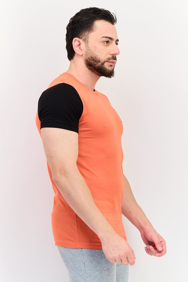 PUMA تي شيرت تدريب قصير الأكمام بتصميم نحيف للرجال من بومة x One8، برتقالي - Image 2