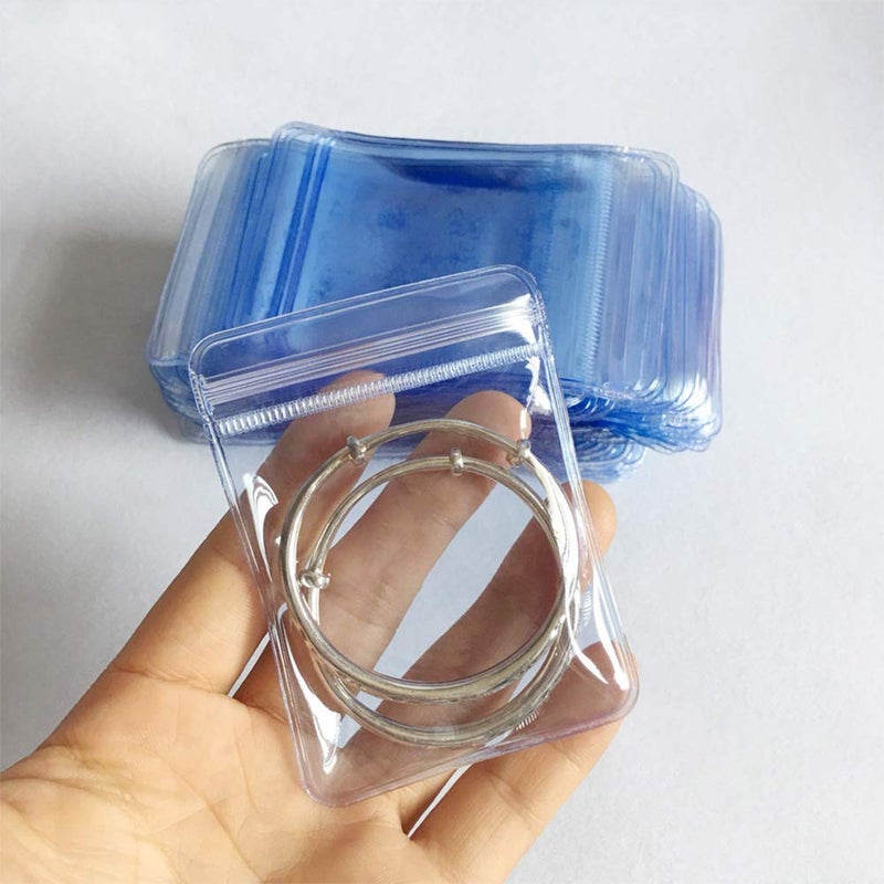 Fnuiddt 100 Pack PVC Clear Jewelry Anti Oxidation Zipper Bag Antitarnish Plastic Bags for Packaging Jewelry Rings Earrings Transparent Poly Pouch Light Blue 275393 inch