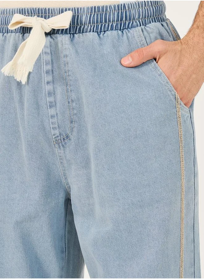 ستايلي Mid Rise Loose Fit Jeans with Contrast Side Stitch and Drawcord Detail