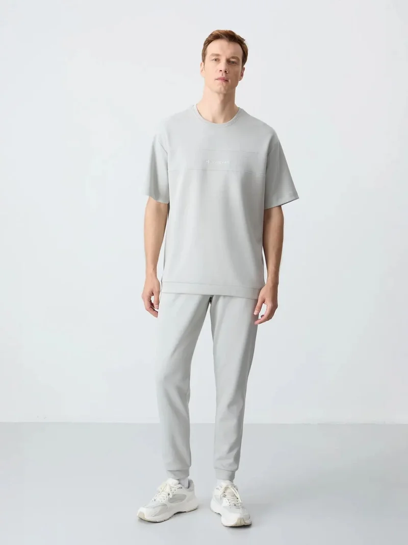 تومي لايف TOMMY Men's Oversized T-shirt And Pants Set