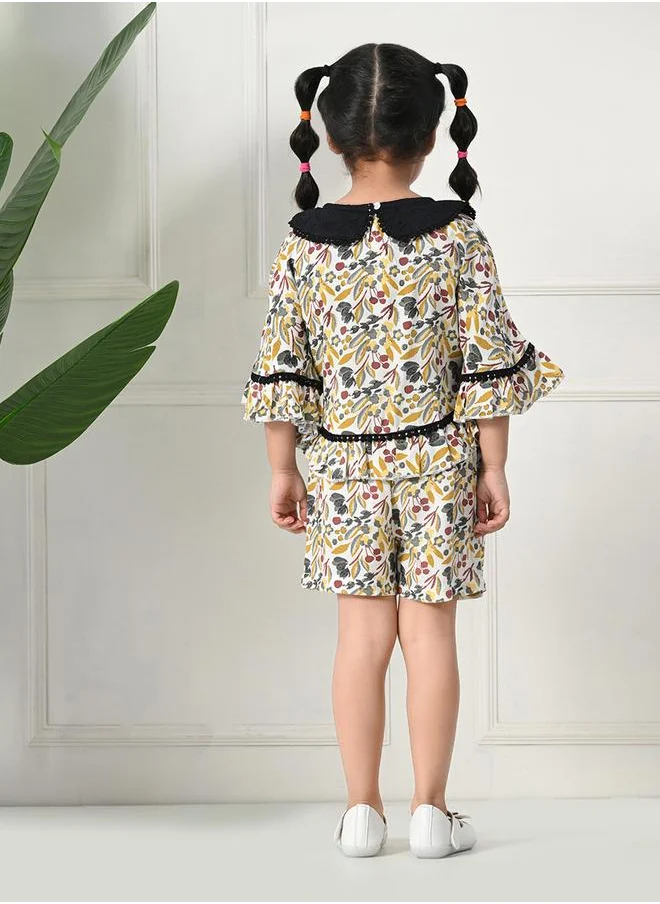 بيلا مودا Bella Moda Printed Ruffled Hem Round Neck Top and Shorts Set