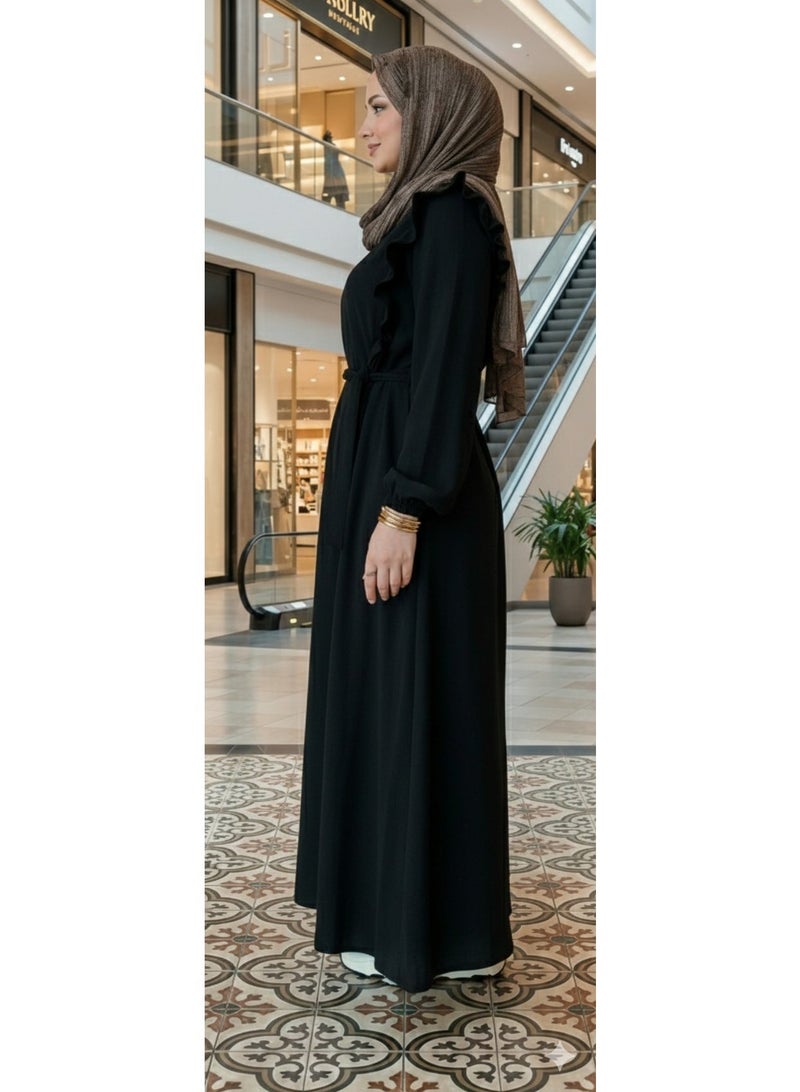 Elegant black women's abaya with ruffle details on the shoulders and a side waist belt – a modern, modest design for elegant occasions and outings. Code 4044 - Image 4