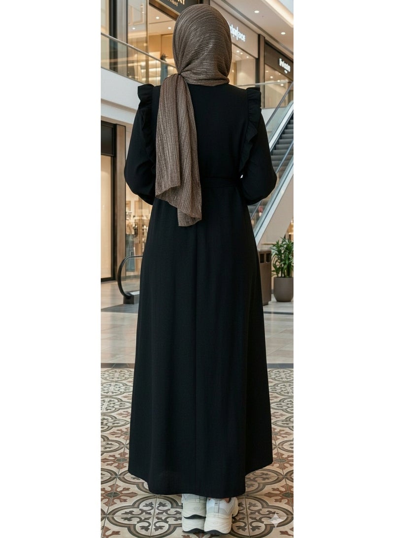 Elegant black women's abaya with ruffle details on the shoulders and a side waist belt – a modern, modest design for elegant occasions and outings. Code 4044 - Image 3