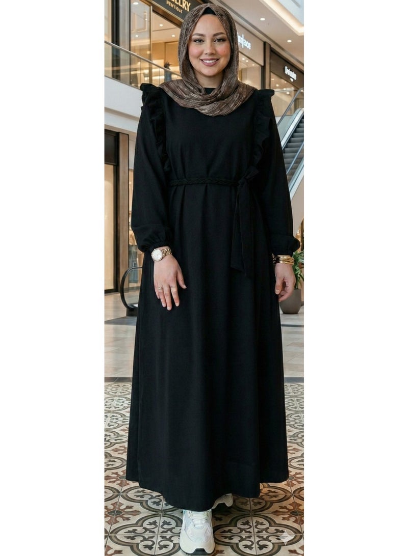 Elegant black women's abaya with ruffle details on the shoulders and a side waist belt – a modern, modest design for elegant occasions and outings. Code 4044 - Image 2