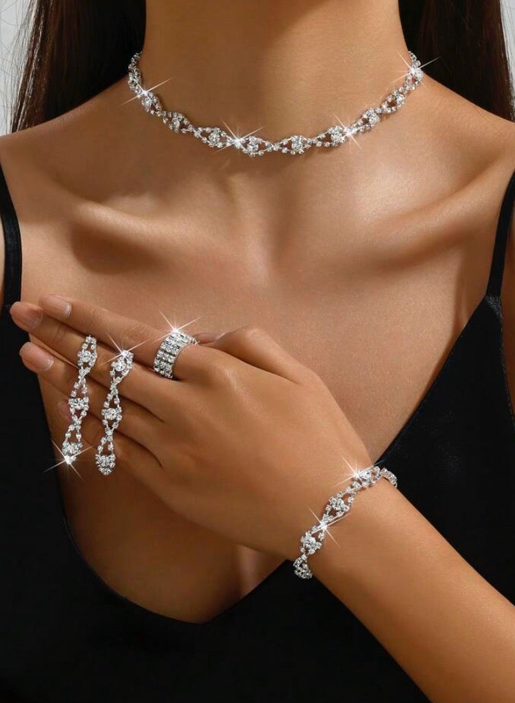 جوليري بالاس طقم اكسسوارات نسائي أنيق مكون من سلسال وحلق اذن واسوارة وخاتم مرصع بالزركون عالي الجودة - Image 1