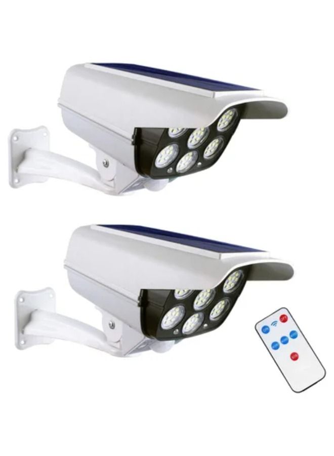 SHOPI 2 Pack Solar Wall-mounted Light with Remote Control, Auto Infrared Motion ​Sensor Light， Simulation Surveillance CCTV Light， Rotatable Angle Adjustable - Image 1