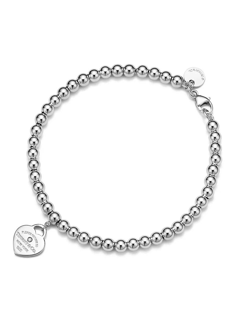 تيفاني اند كو سوار تيفاني الأحمر المصنوع من خرز القلب الصغير من الفضة مع الماس، مقاس 4 مم - Image 4