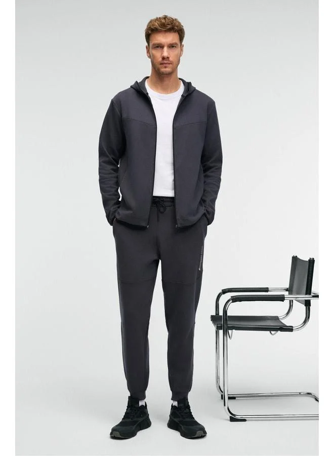 GRIMELANGE GELIDO Men's Elastic Waist Cuffed Leg Corded Karyoka Stitch Printed Anthracite Sweatpants.