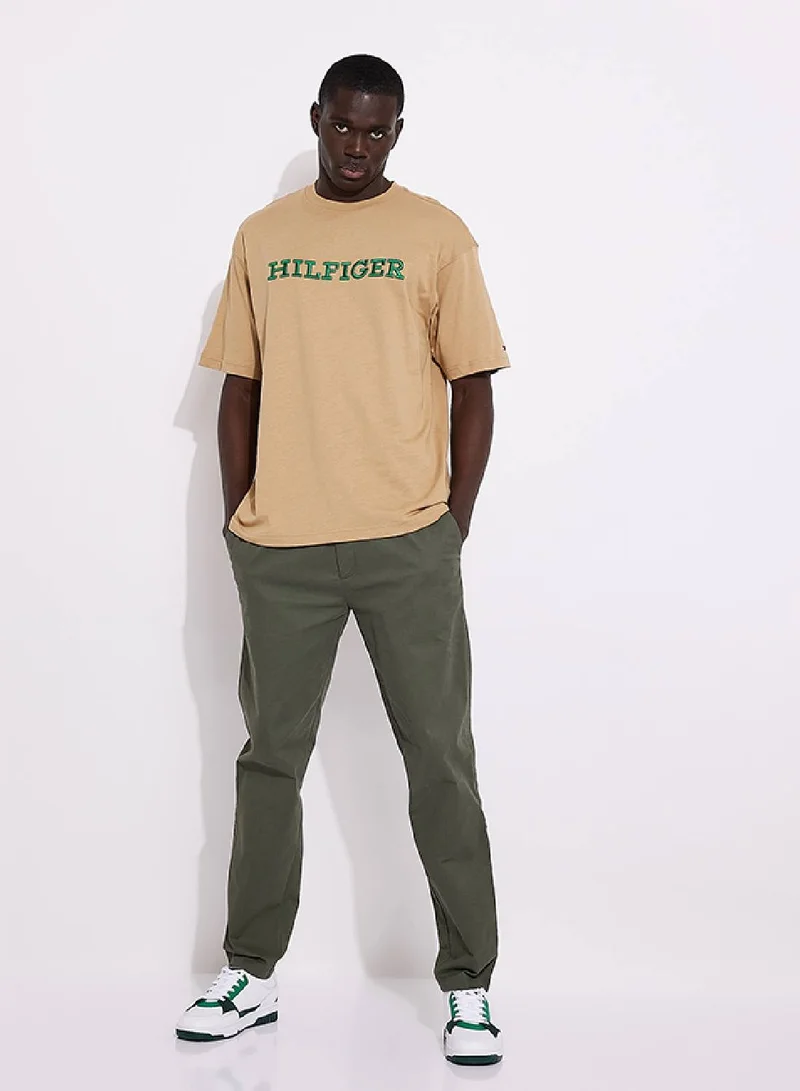Tommy Hilfiger Classic Khaki Hilfiger Monotype Archive Fit T-Shirt for Men | Best Price UAE