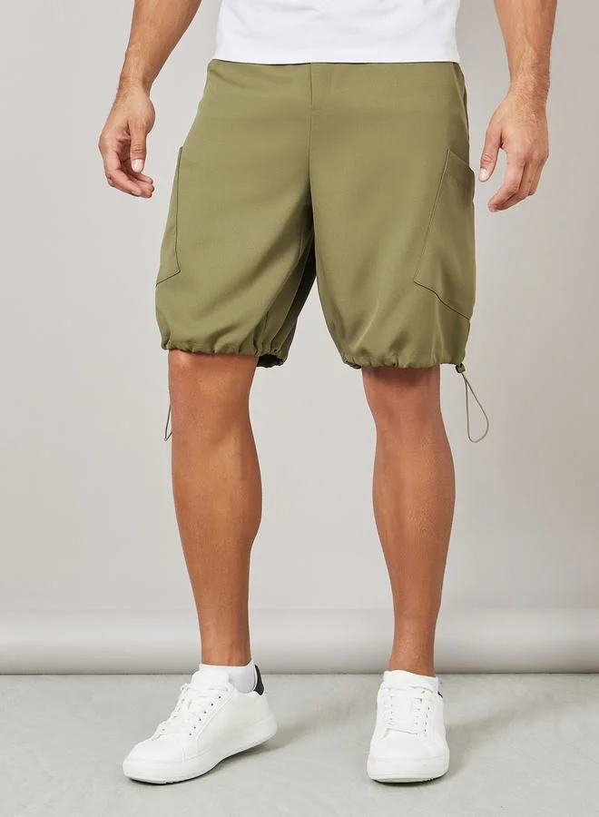 Styli Oversized Parachute Woven Drawcord Hem Shorts with Pocket Detail