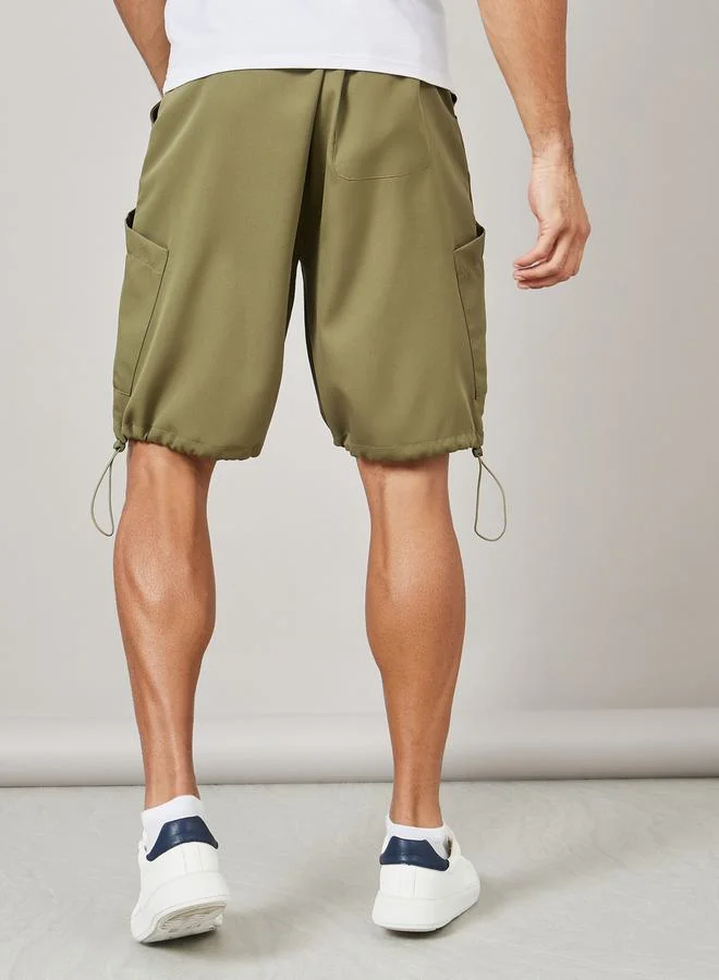 Styli Oversized Parachute Woven Drawcord Hem Shorts with Pocket Detail