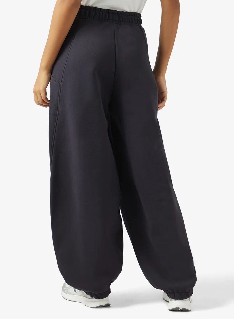 New Balance DARK NIGHT (DNT) Athletics Crafted Fleece Sweatpants for Women | Best Price UAE