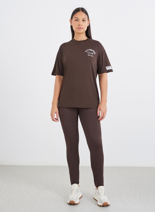 Styli Gymspire Edition - Label and Tab Dropped Shoulder Short Sleeve Top with Text Detail - Image 1