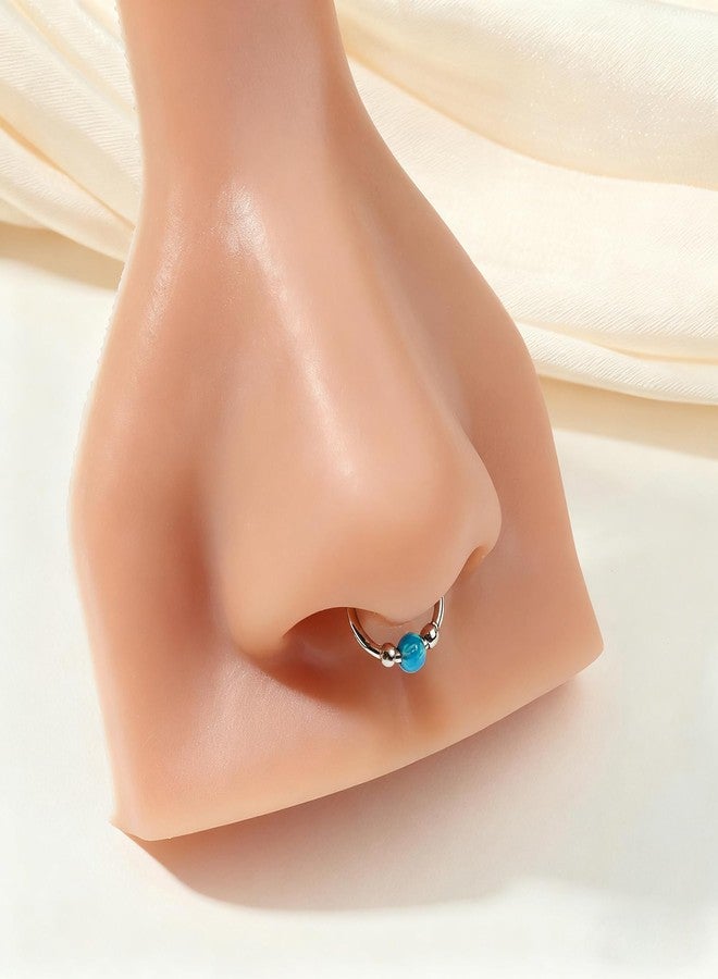 مجموعة حلقات أنف TOKRING مقاس 18G للنساء، وحلقات أنف مرصعة بحجر الأوبال الأزرق مقاس 20G، مصنوعة من الفولاذ المقاوم للصدأ، مضادة للحساسية، مناسبة لثقب الحاجز الأنفي وفتحة الأنف، 4 قطع - Image 5