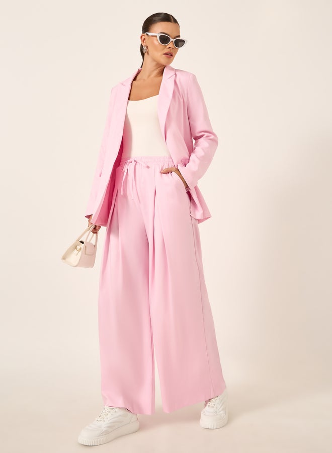 Styli Solid Inverted Pleated Wide Leg Pants - Image 1