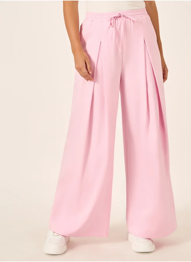 ستايلي Solid Inverted Pleated Wide Leg Pants