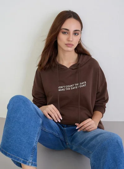 Styli Brown Oversized Slogan Print Hoodie