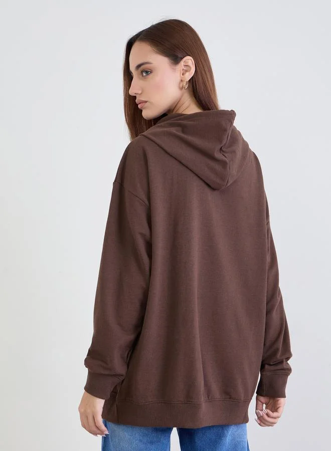 Styli Brown Oversized Slogan Print Hoodie