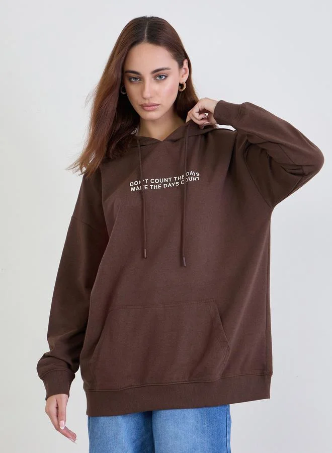 Styli Brown Oversized Slogan Print Hoodie
