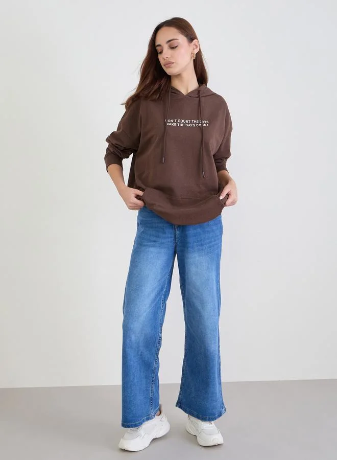 Styli Styli Brown Oversized Slogan Print Hoodie
