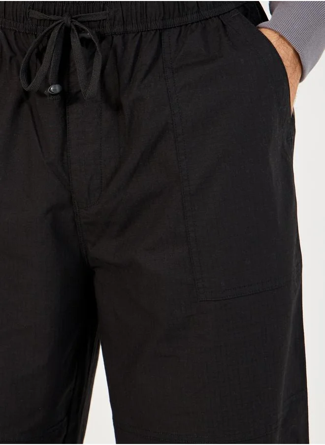 Styli Slogan Print Baggy Parachute Fit Pants with Drawstring