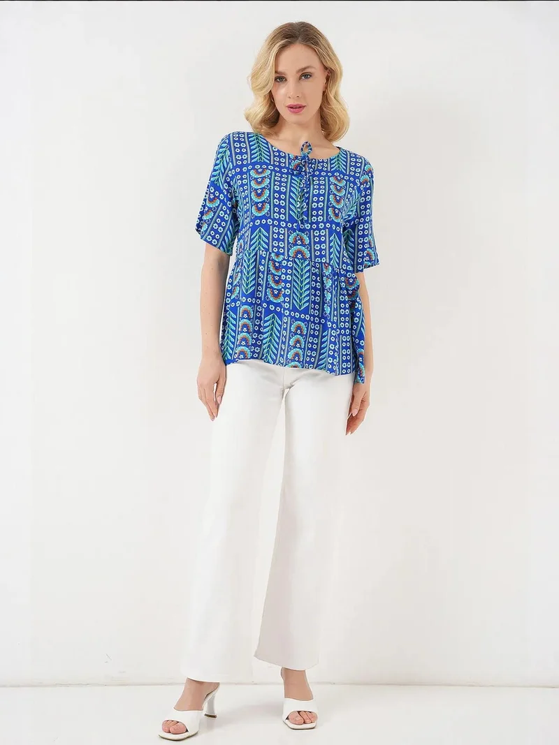 بيغ دارت بلوزة بياقة دائرية بنقوش مع تفاصيل فيونكة