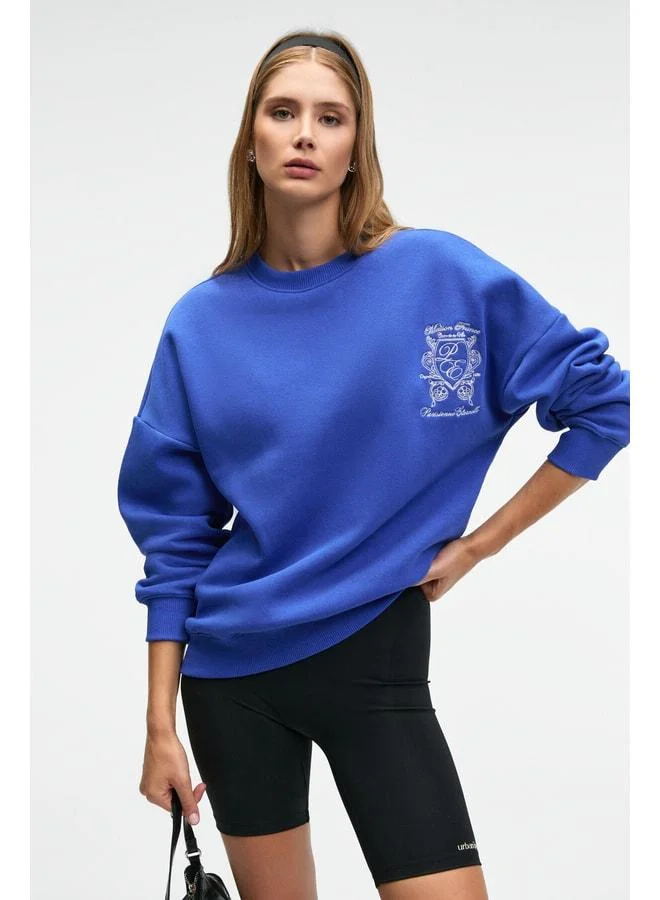 GRIMELANGE AUDRA Women's Oversized Round Neck Sweatshirt with Embroidery Details in Blue.
