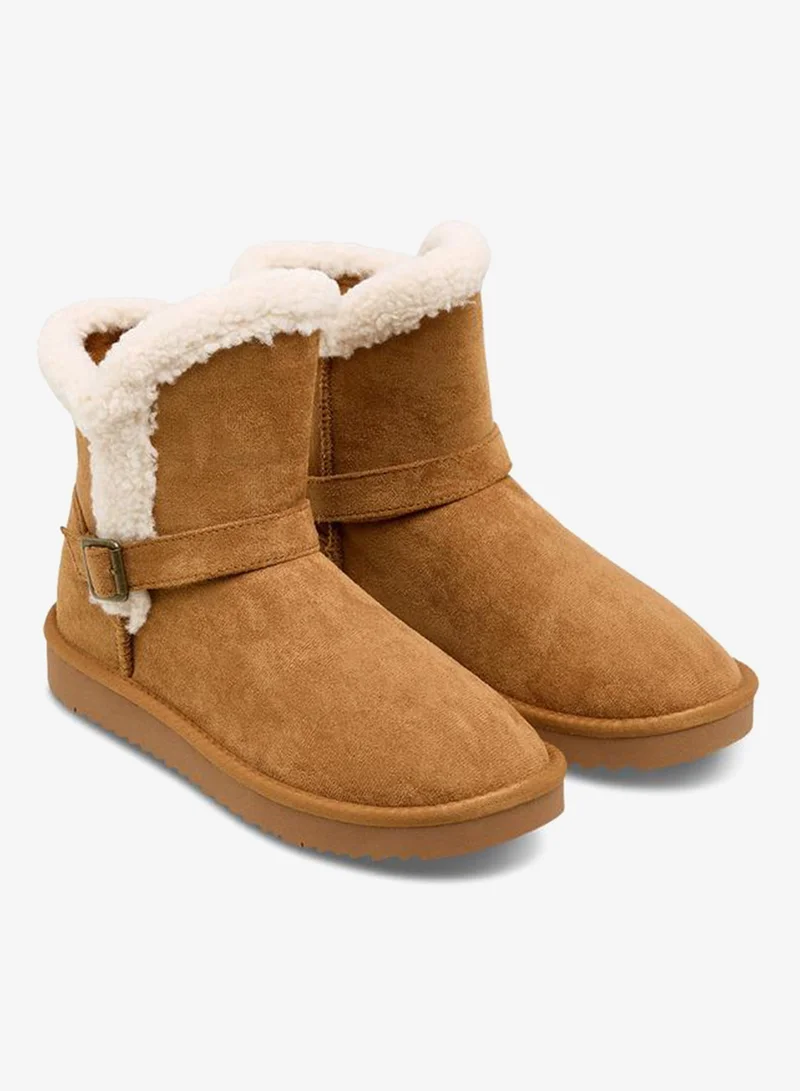 سيليست بوت نسائي بطول الكاحل من الفرو الصناعي