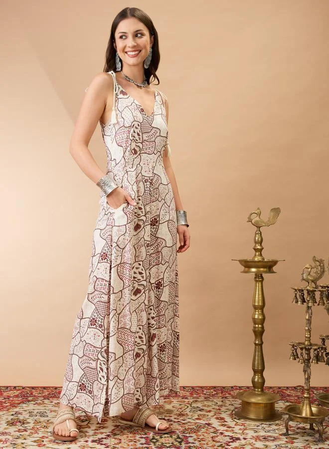 جلو باص جمبسوت بطبعة عرقية وأكمام برباط وأرجل واسعة