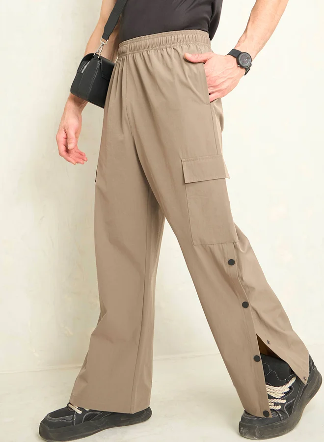 SASSAFRAS Solid Button Detail Baggy Parachute Pants