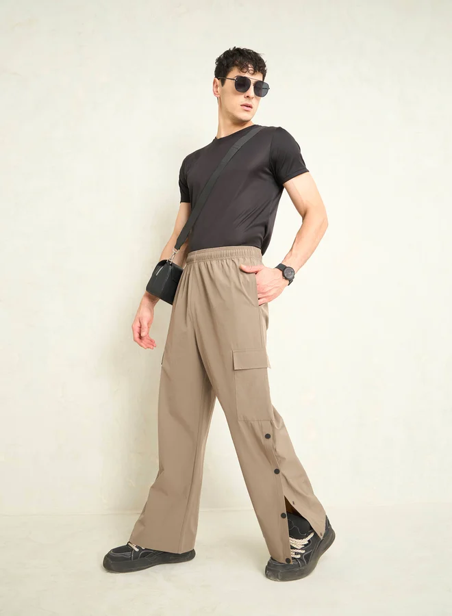 SASSAFRAS Solid Button Detail Baggy Parachute Pants