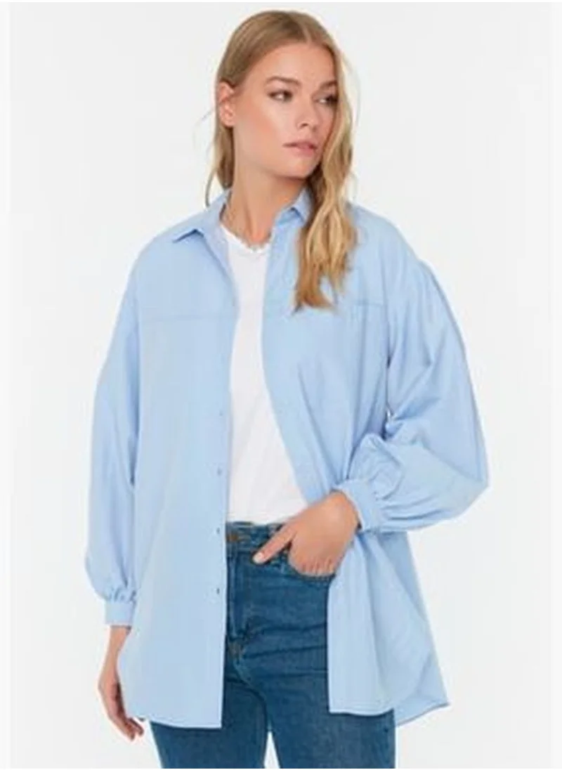 trendyol Light Blue Balloon Basic Knit Shirt with Pocket Detail Long Back of the Sleeves TCTSS21GO0976