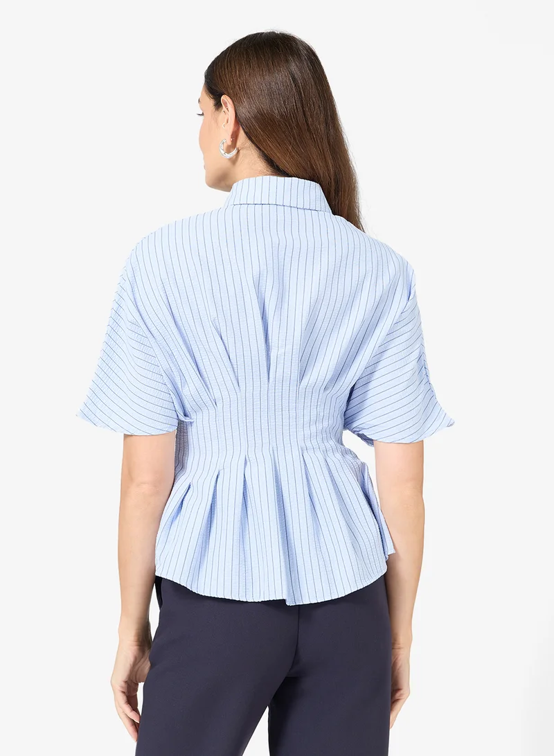 ايلا قميص بأكمام الخفاش