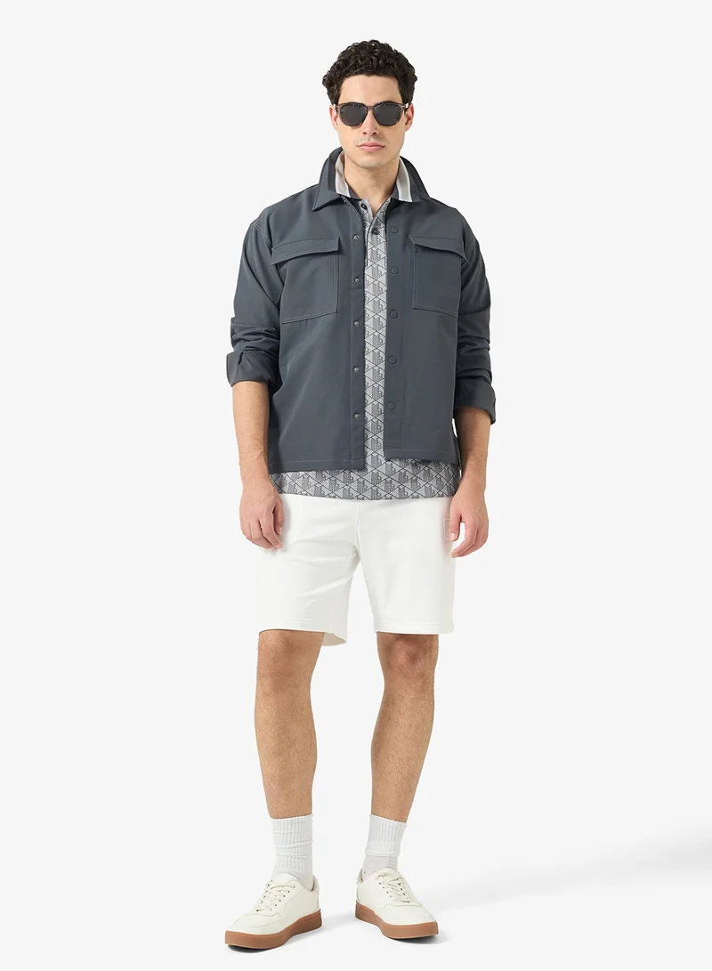 LACOSTE  Classic Fit Monogram Jacquard Polo Shirt for Men | Best Price UAE