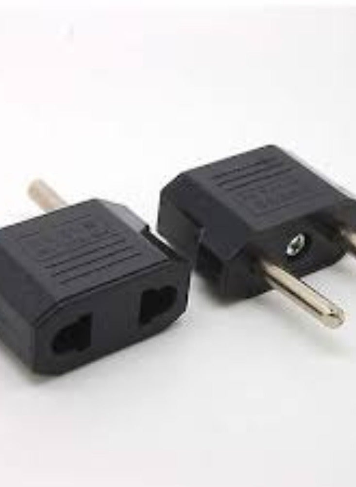 KNP KNP Black Travel Adapter is a versatile and practical accessory designed to enable the use of electronic devices in different countries. - Image 1