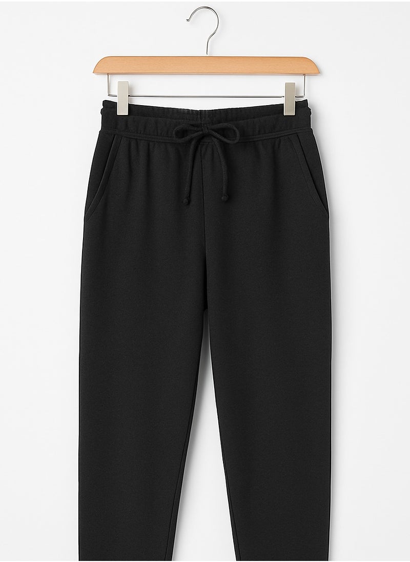 LOUD UNIVERSE Women's Black Jogger Pants – 100% Cotton Casual Sweatpants with Drawstring Waist & Cuffed Ankles | Lounge & Activewear  - Image 4
