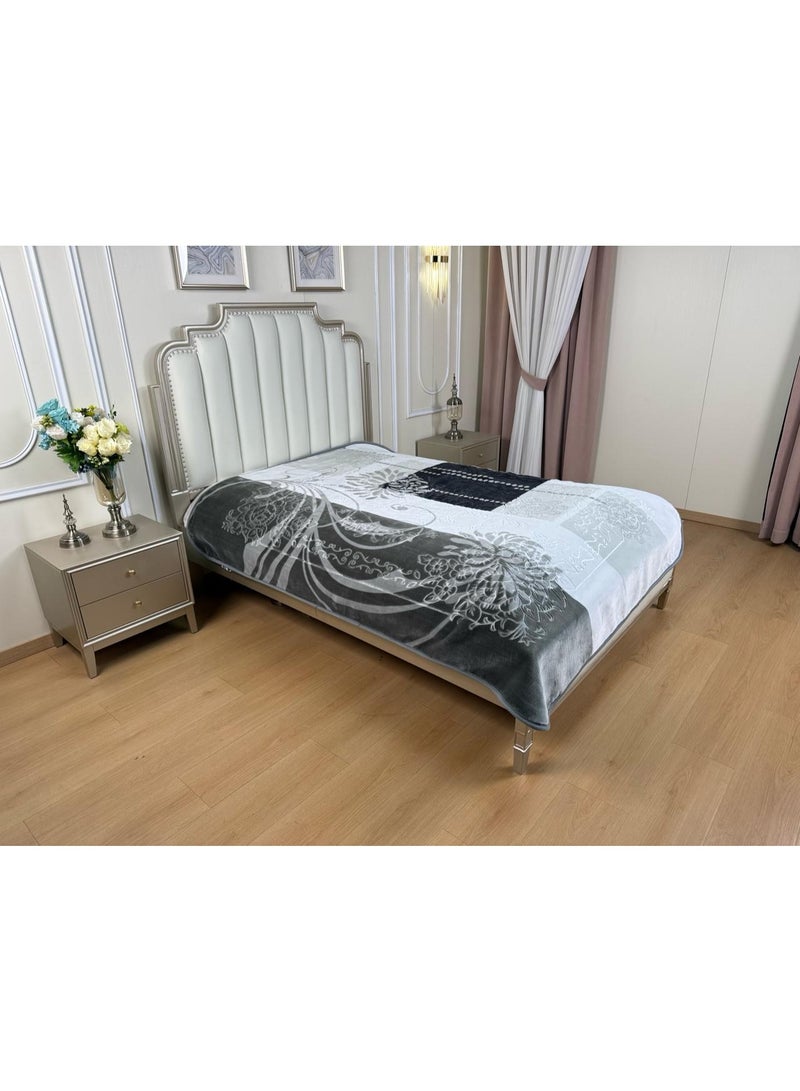 A heavy, velvety winter blanket for a double bed (4 kg), featuring classic, raised laser-etched patterns and distinctive modern motifs, with a soft texture.