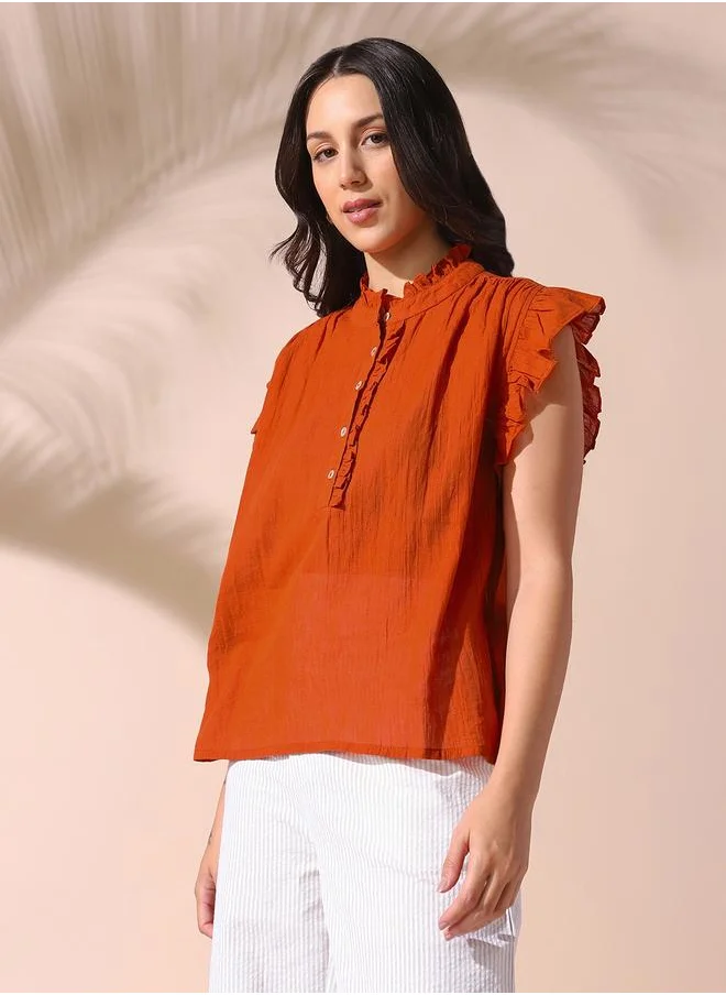 دينيس لينغو Women rust regular fit solid sleeveless t-shirt 100% cotton top with button closure- where comfort meets classic charm.