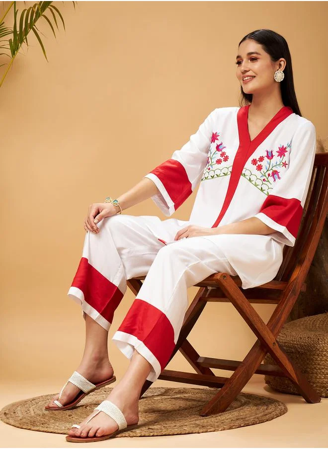 ساسافراس Floral Embroidered Contrast Hem Top & Straight Leg Pants Co-Ord by Styli