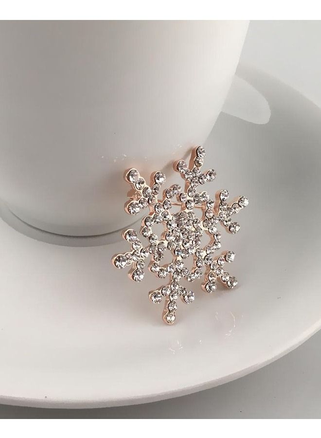 Distinctive and elegant unisex pin brooch with ice crystal design encrusted with sparkling crystals