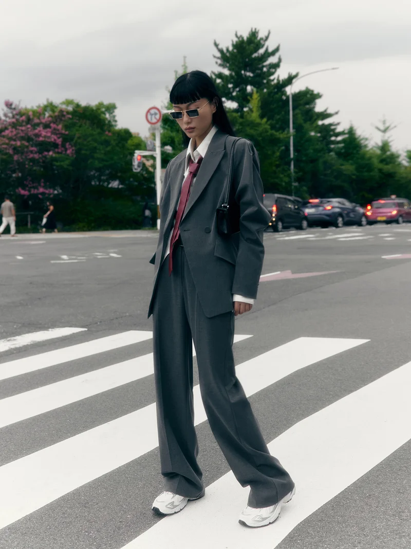 Lichi Straight suiting trousers with stitched creases and a belt