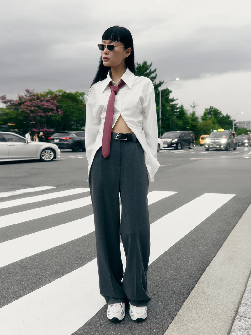 Lichi Straight suiting trousers with stitched creases and a belt